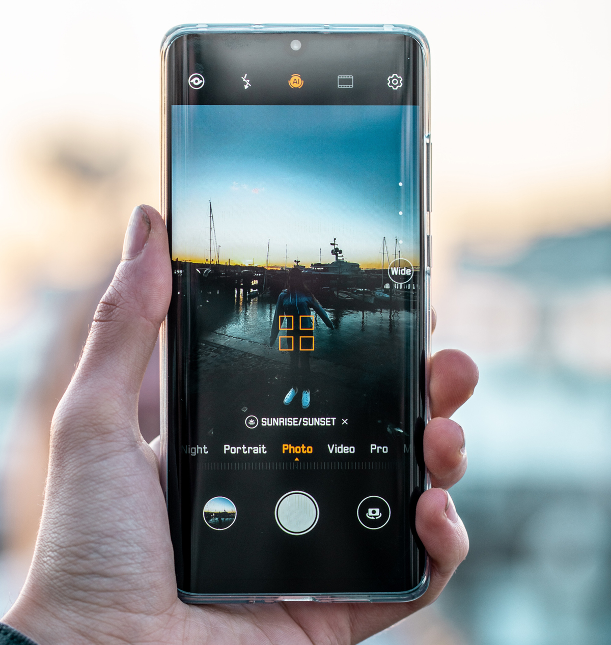 A Huawei P30 Pro in a persons hand taking a picture