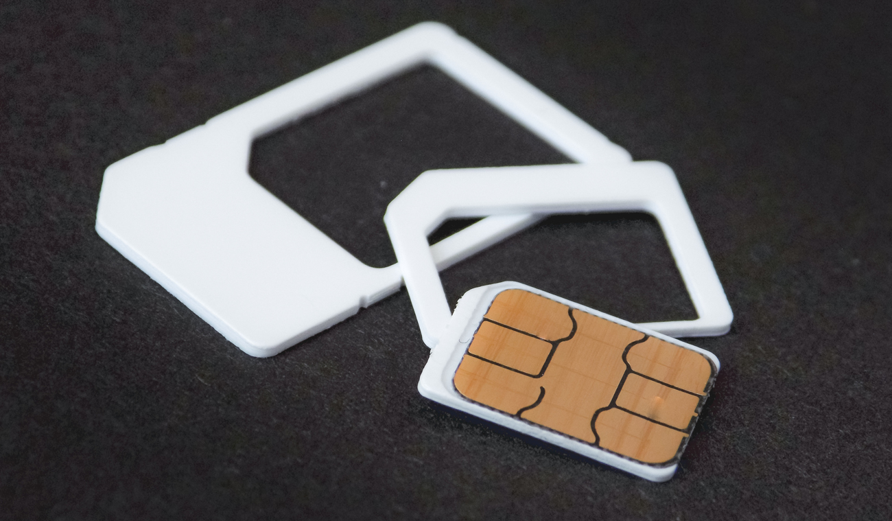 A sim card with frames to fit various devices