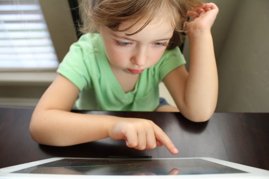 Young girl using tablet