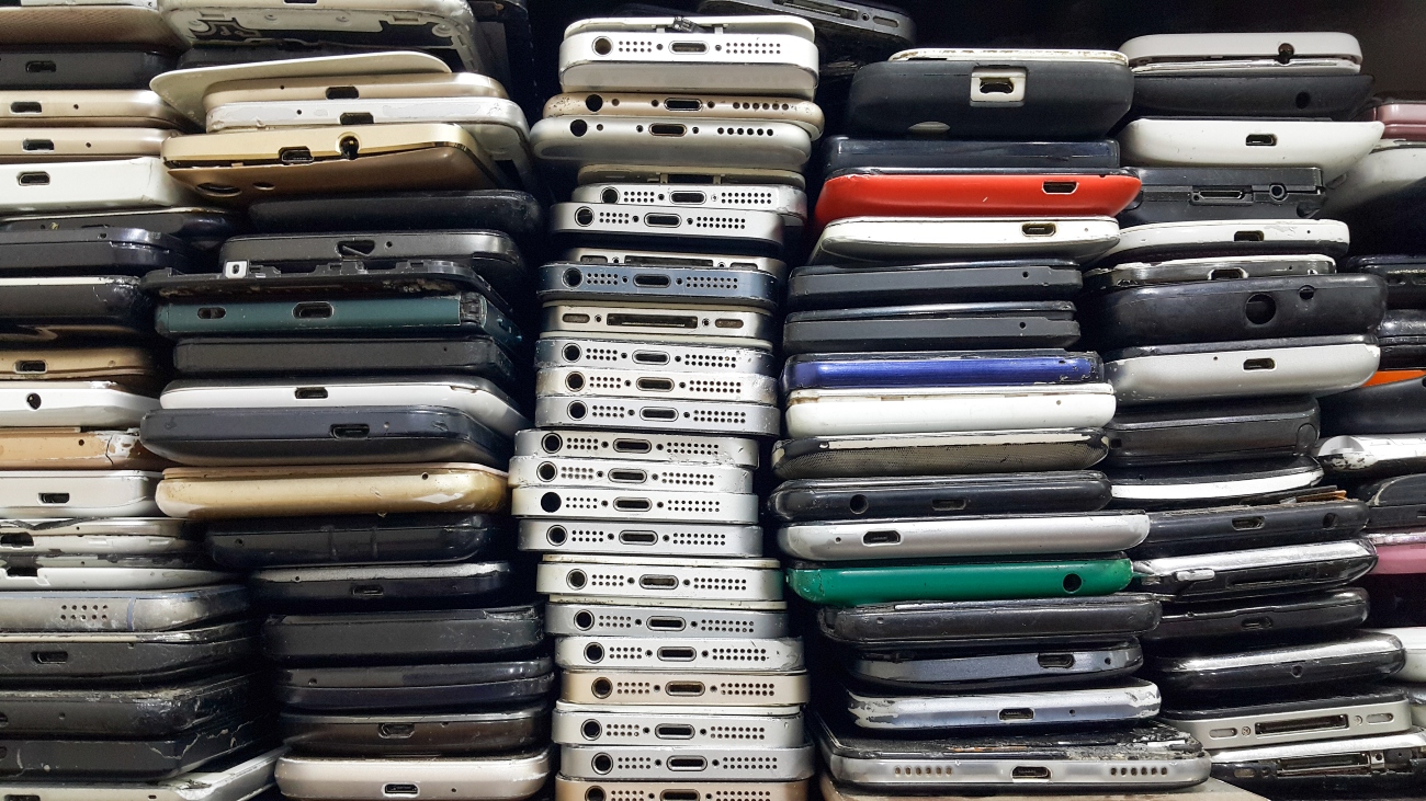 stack of broken phones